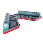 Left-angled view of the inflatable Hawaii Big Atoll in teal and red with black traction pads and dual side bolsters.