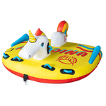 Side angled view of Unicorn, a yellow inflatable towable with a unicorn head and rainbow tail, featuring multiple handles.