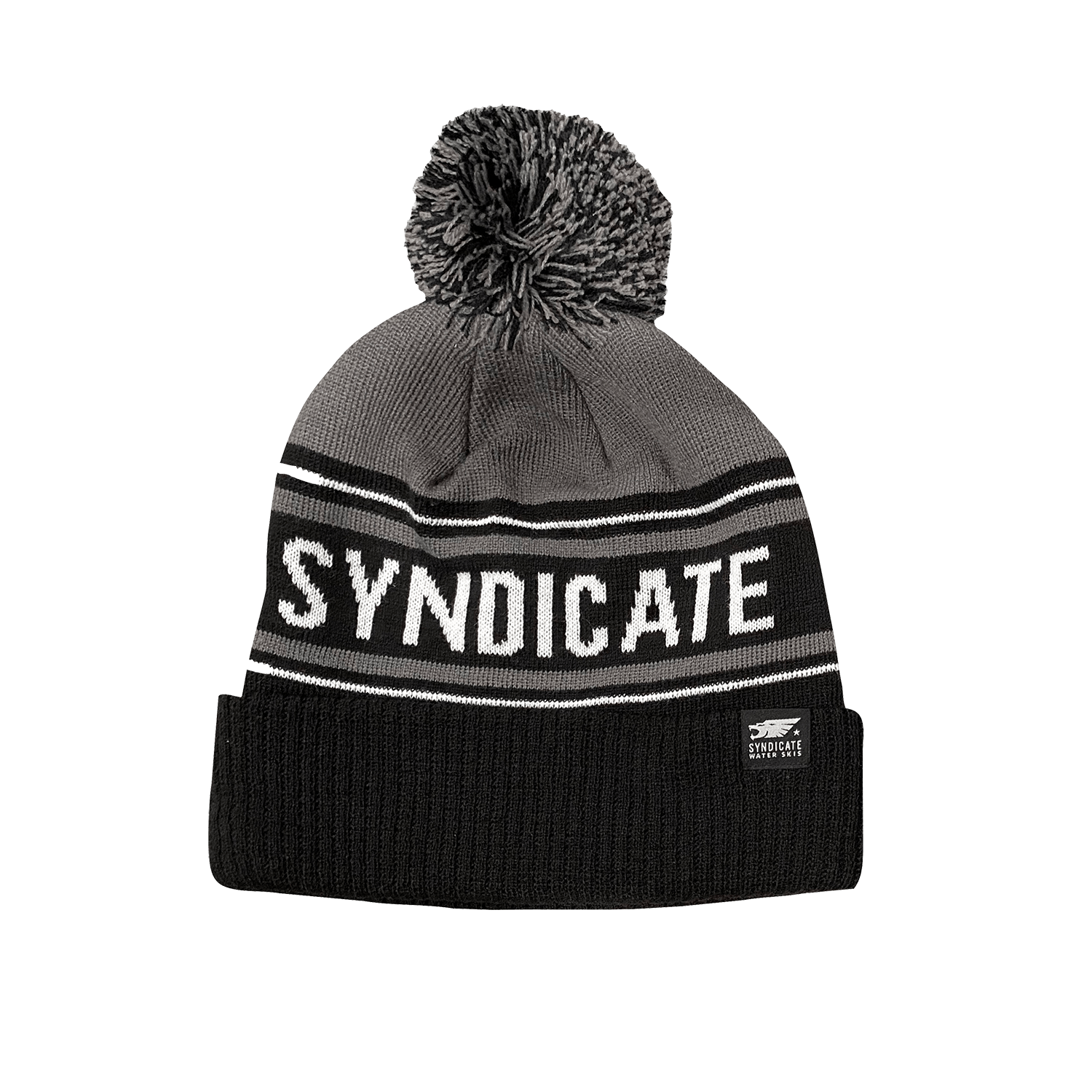 Front view of the Syndicate Pom Pom Beanie in black, featuring a black fold-over cuff, white lettering, and a gray pom.