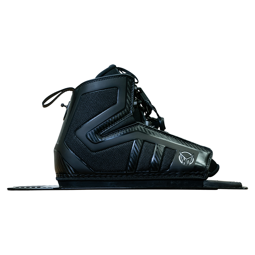 Side view of Stance 130 Rear waterski boot in black with a supportive high cuff, durable materials, and a mounting plate.